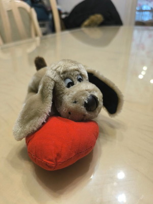 Plush dog with red heart like new