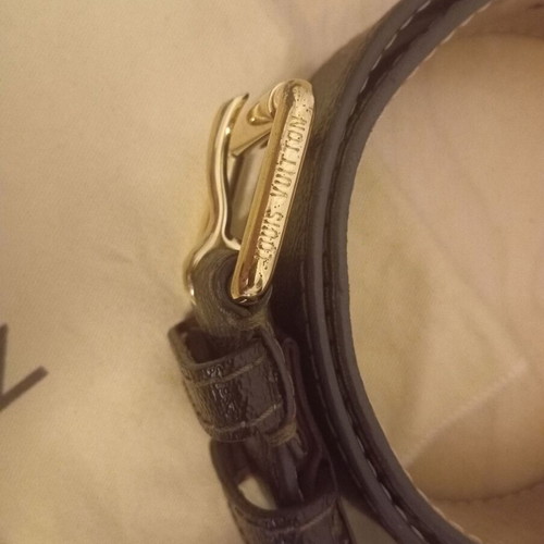 Louis Vuitton belt collectible like new, brown, size S