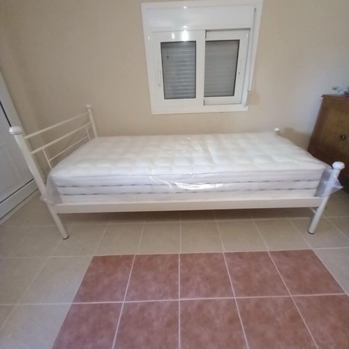 Iron bed new with mattress