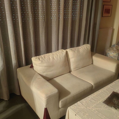 Two-seater sofa used, made of solid wood