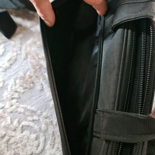 Ormi briefcase like new, hand and shoulder, black-brown