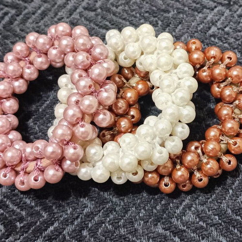 Hair ties new with beads in three colors