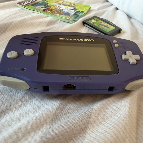 Game Boy Advance with Scooby Doo game like new, no charger
