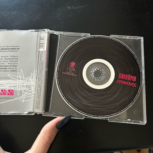 Onirama remixes CD used with videoclips, broken case