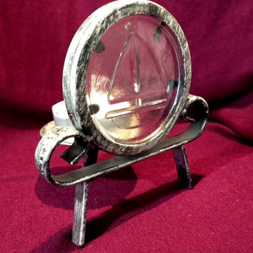 Metal tealight holder like new with glass sailboat decoration