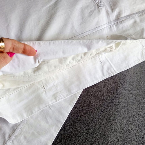 Vintage white cotton pillowcases pair with embroidery used