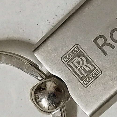 Rolls-Royce keychain like new, silver with pearl finish