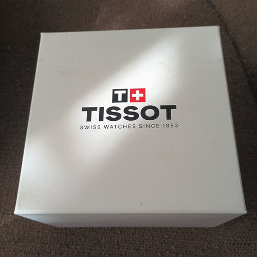 Tissot Classic Gent watch with 18k gold bezel, quartz, new