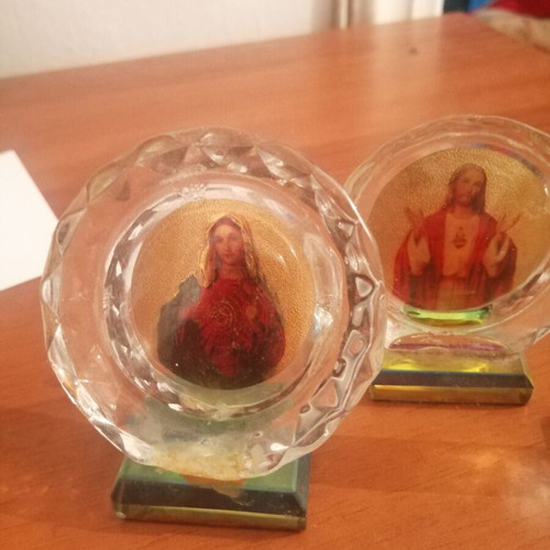 Small religious desk icons: Virgin Mary, Jesus, Crucifixion
