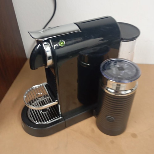 Delonghi Nespresso coffee machine with milk frother