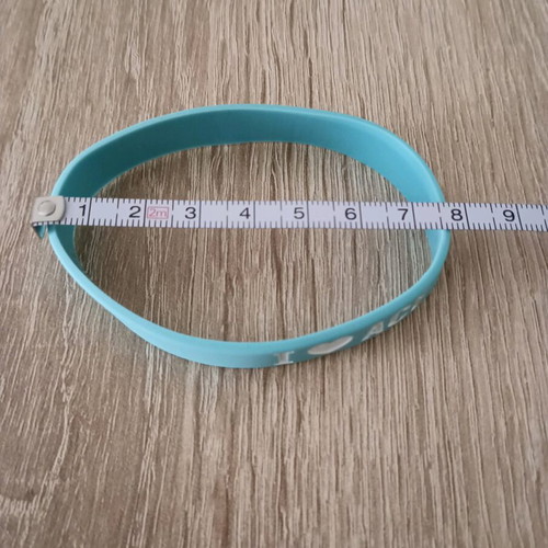 Athens Coffee Festival bracelet like new, turquoise rubber unisex