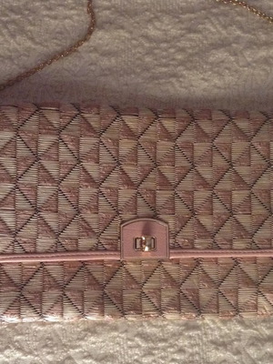 Straw crossbody envelope bag used in pink shades