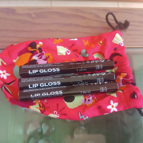 Lip gloss set in three shades with pouch, new