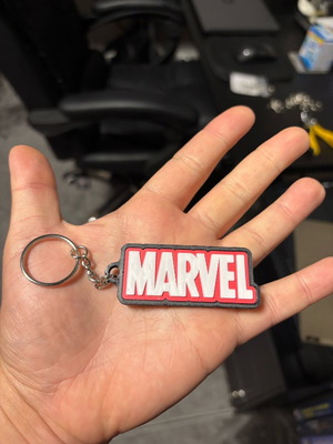 Marvel keychain like new, black and red