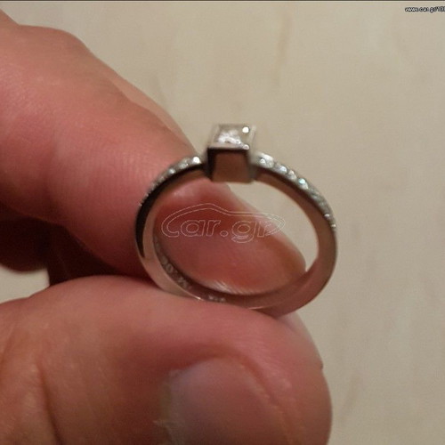 Ring new with certification, carats, special order square stone