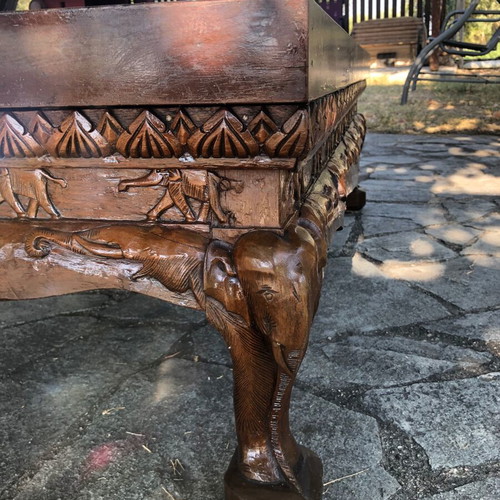 Handcrafted carved wood table with elephants and matching stool, Asian style
