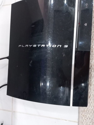 PlayStation 3 console used, complete with controller and cables