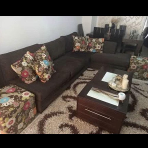 Corner sofa set used with two stools and coffee table with storage