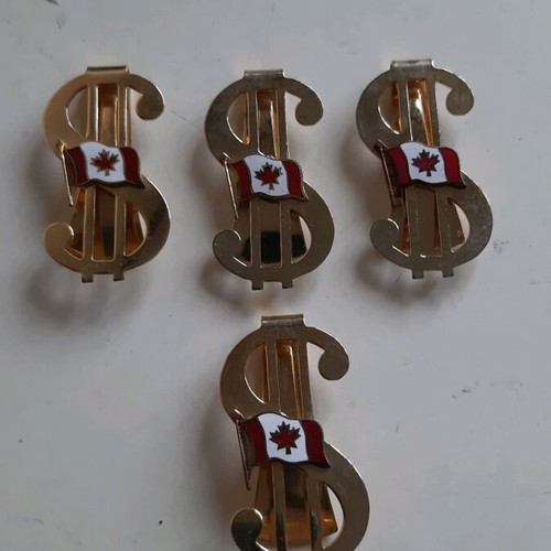 Dollar tie clips with Canadian flag, like new, set of 4
