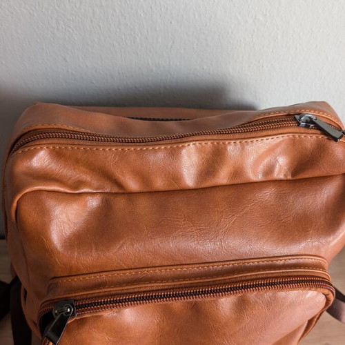 Vintage unisex backpack in brown faux leather with laptop compartment