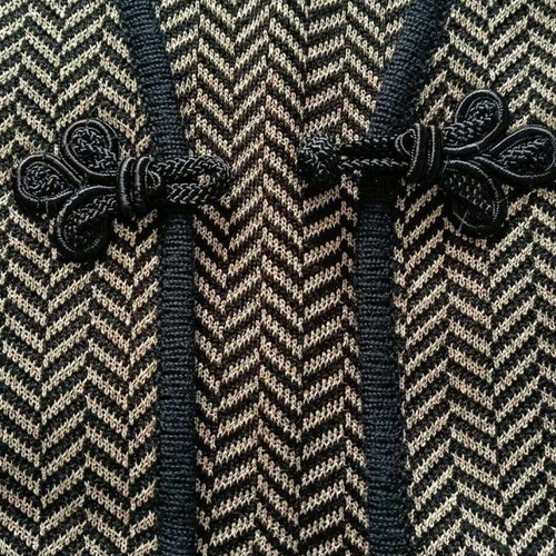 Black Kazaka with gold knit used, size L