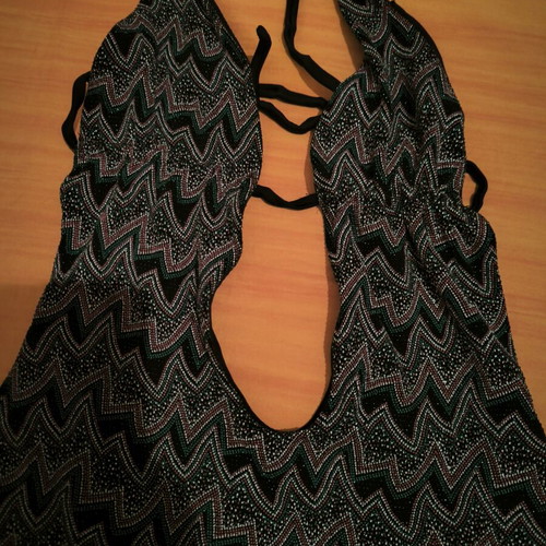 One-piece swimsuit like new with small beads, black and multicolor