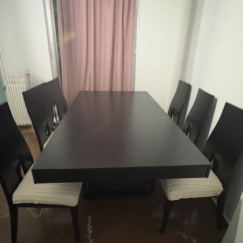 Dining table with set of 6 chairs like new, black, rectangular with extensions