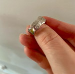 Silver ring with white and yellow zircon used