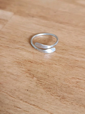 Ring with hammered edges handmade, silver color