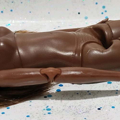 Barbie Made to Move African-American doll used with small flaws