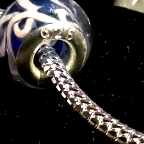 Silver 925 bracelet like new with 4 charms, 20 cm length