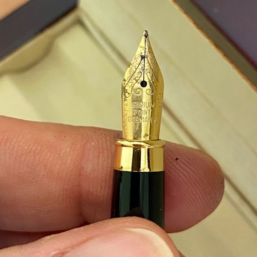 Pen and pencil set like new with wooden case and gold details