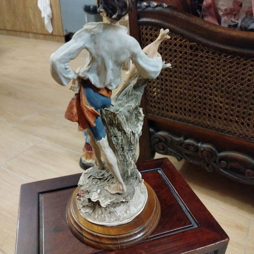Boy statue with wooden base like new, height 35cm