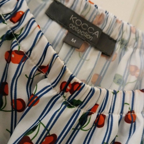 Sleeveless dress with ruffles like new, stripes and cherries print
