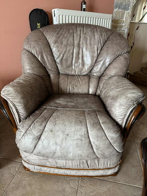Armchair used, natural leather with wooden details