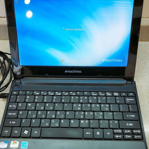eMachines eM355 netbook 10.1" like new with charger