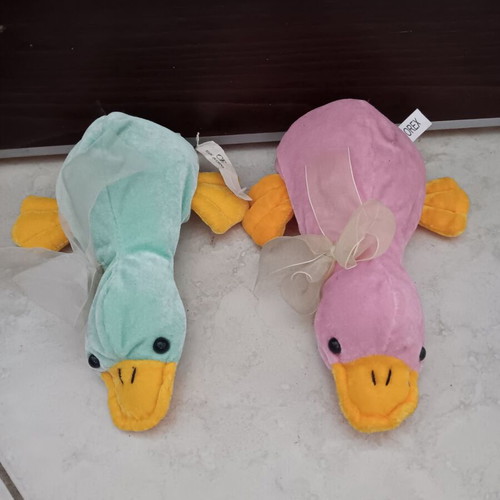 Plush ducks used, sold together