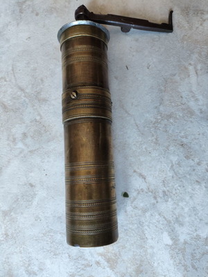 Bronze antique manual coffee grinder used