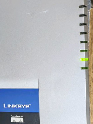 Linksys Wireless G ADSL Home Gateway used with 4 Cisco Ethernet ports