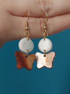 Butterfly stainless steel earrings new, mother of pearl and clay