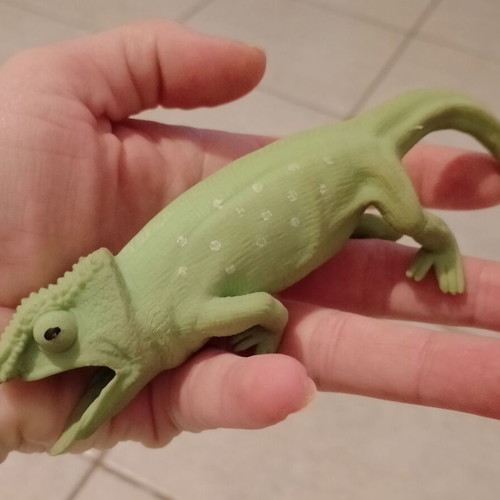 Rubber toys set of 4 used, chameleons and reptiles