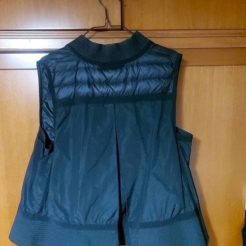 Moncler sleeveless vest used with pleat detail at back, black