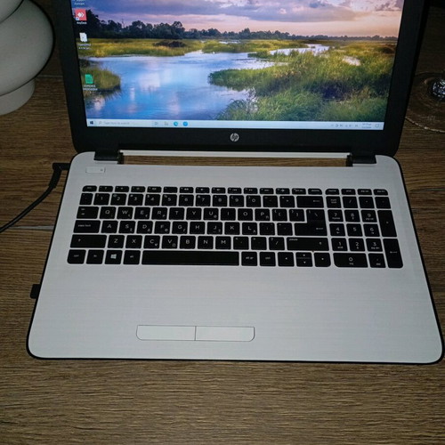Hp laptop used, 15" screen, AMD E-Series, 4GB RAM, SSD