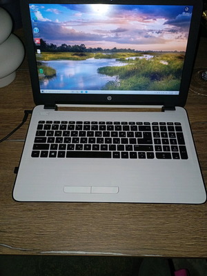 Hp laptop used, 15" screen, AMD E-Series, 4GB RAM, SSD