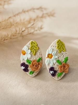 Handmade earrings with detailed craftsmanship
