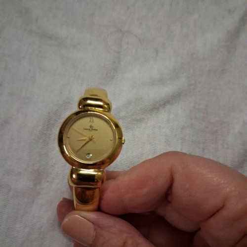Laurent Dodane women's watch like new, gold color