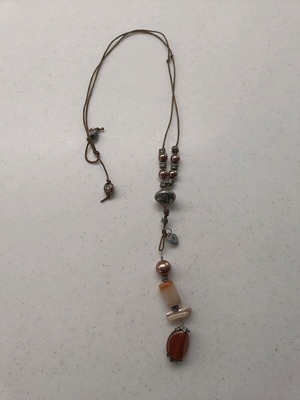 Necklace with beads and stones