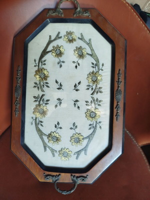 Vintage serving tray with intricate gold embroidery