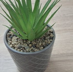 Artificial flower in ceramic pot
