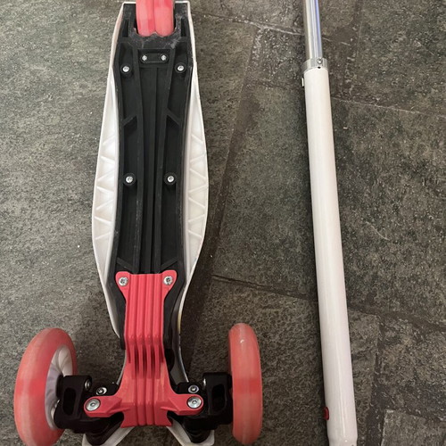 Children's three-wheel scooter used with adjustable handlebar